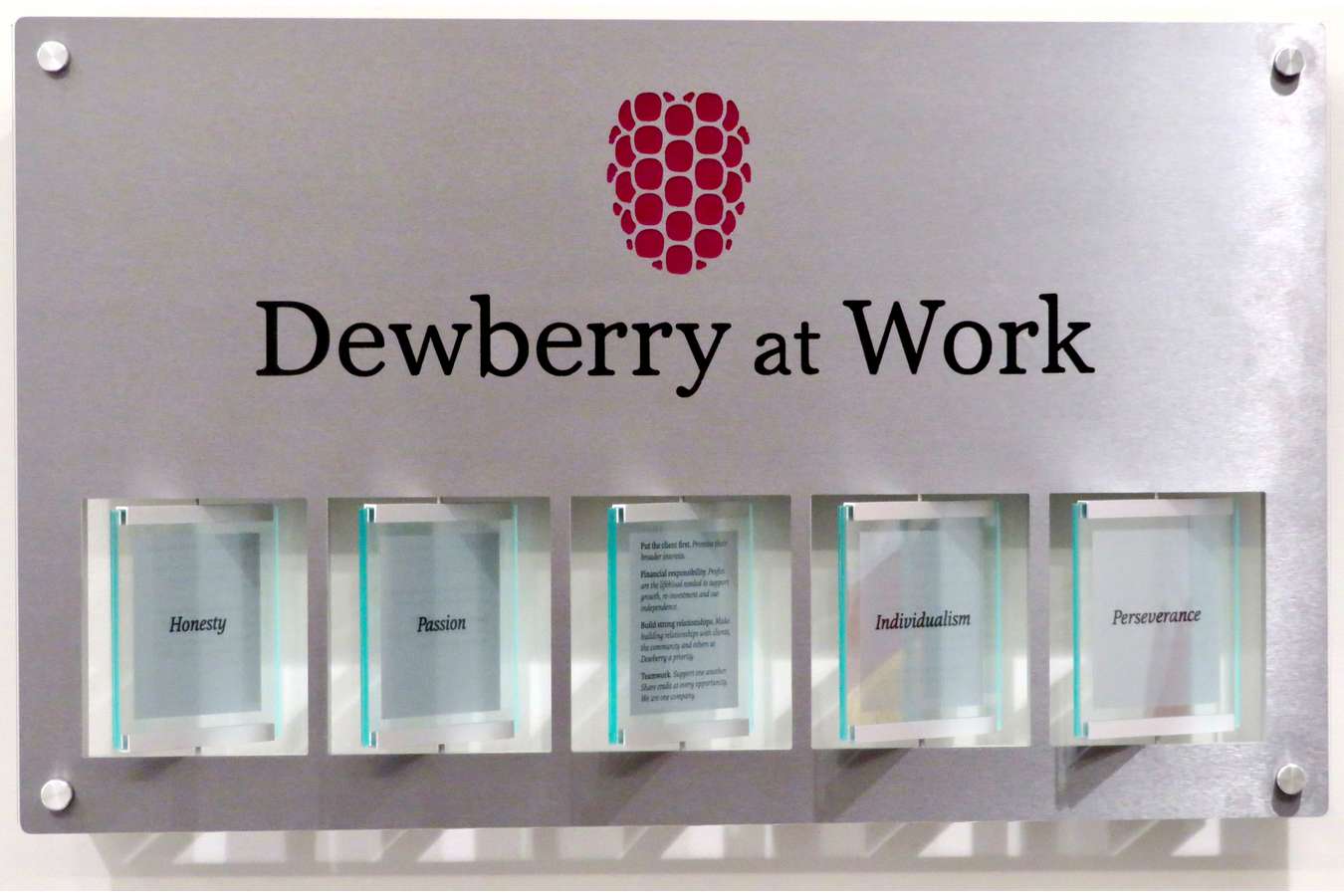 Dewberry Spinner : Spinner plaques encourage visitors to read Dewberry's 5 Qualities in corporate lobbies