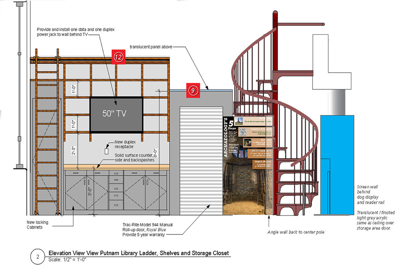 CAAM 6 Spiral : The spiral stairway to offices uses graphic panel and roll door to secure storage area  